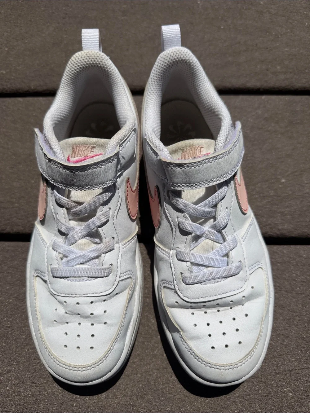 Youth size 1.5 Nike White Sneakers with Pink Swoosh Accent
